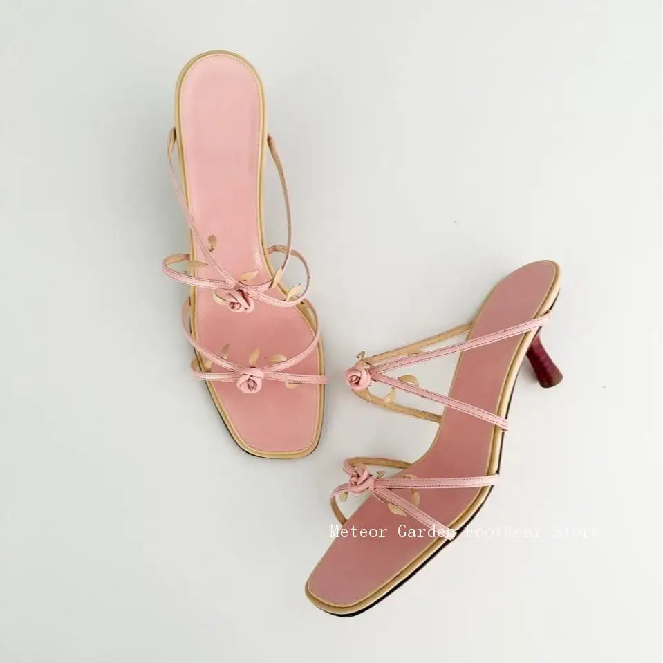 Pair of pink rose square toe low heel sandals