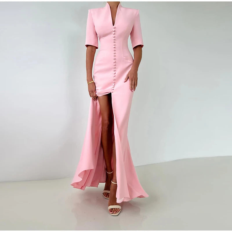 Pink dress with a high slit on a white background