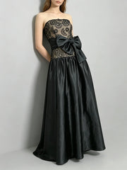 Strapless lace bodice full skirt gown with bow accent