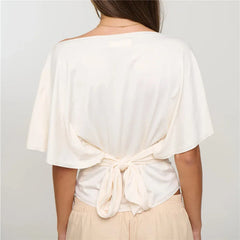 Back view of white off shoulder boat neck crop top