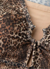 Leopard print fabric with a close-up of the texture and pattern.