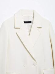 White coat with a black label on a white background
