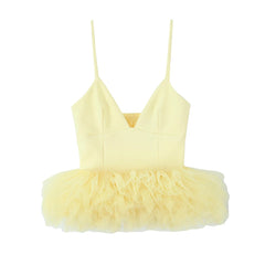 Yellow dress with a fluffy skirt on a white background