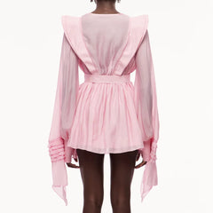 Pink dress with long sleeves and a belt - back