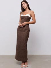 Back view of contrast plaid maxi dress with spaghetti straps.
