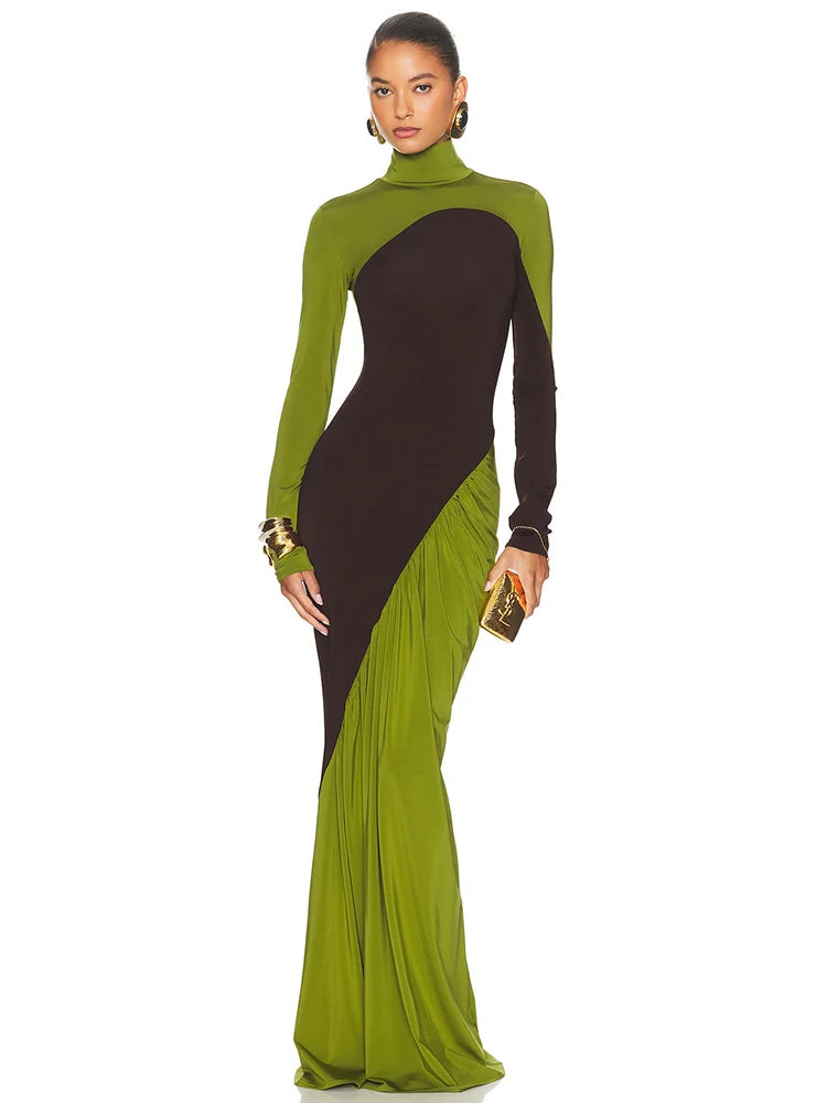 Woman wearing a green and black dress