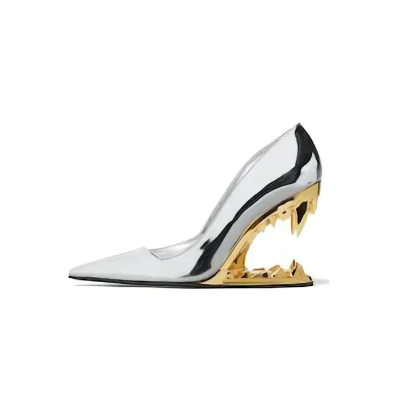 Silver high-heeled shoe with gold heel on a white background