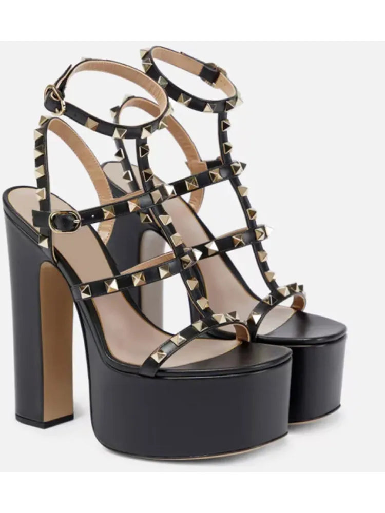 Black platform sandals with gold studs