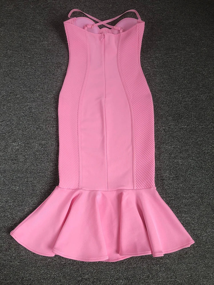 Pink dress with a fitted bodice and flared skirt on a dark gray background