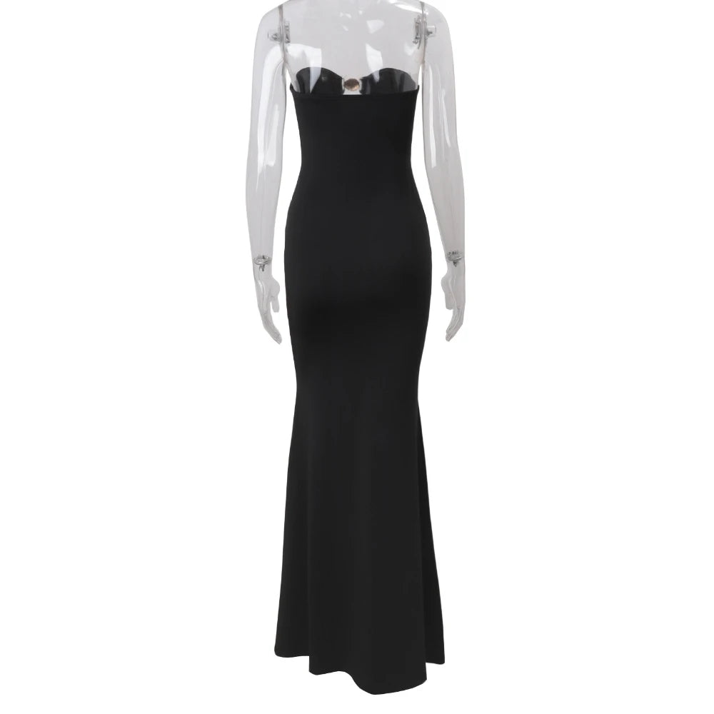 Black evening gown on a transparent mannequin against a white background