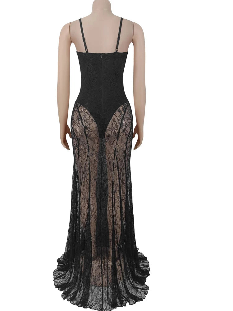 Black lace evening gown on a mannequin against a white background
