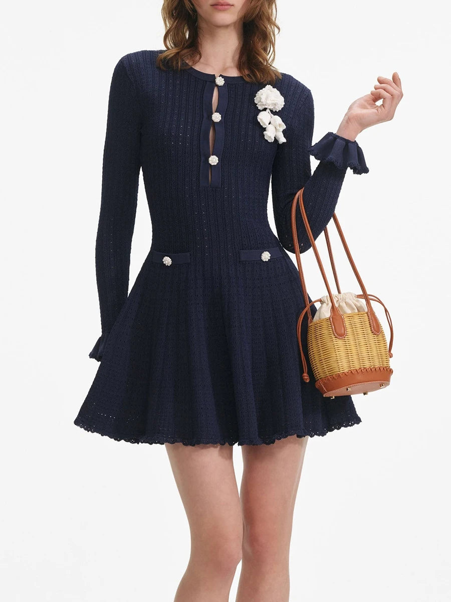 Knit mini dress with flower appliqué and decorative buttons