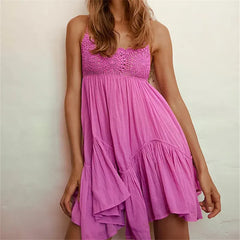 Pink crochet lace mini dress with spaghetti straps and ruffle hem