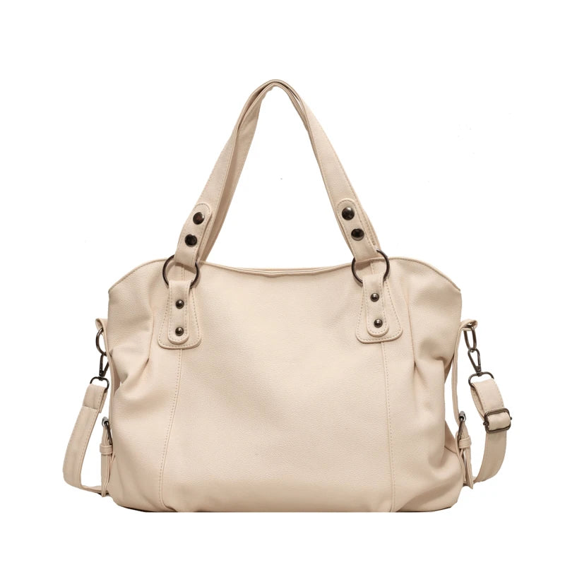 Beige tote bag with twin top handles and a detachable shoulder strap