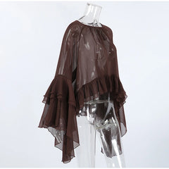Brown sheer blouse on a clear mannequin against a white background