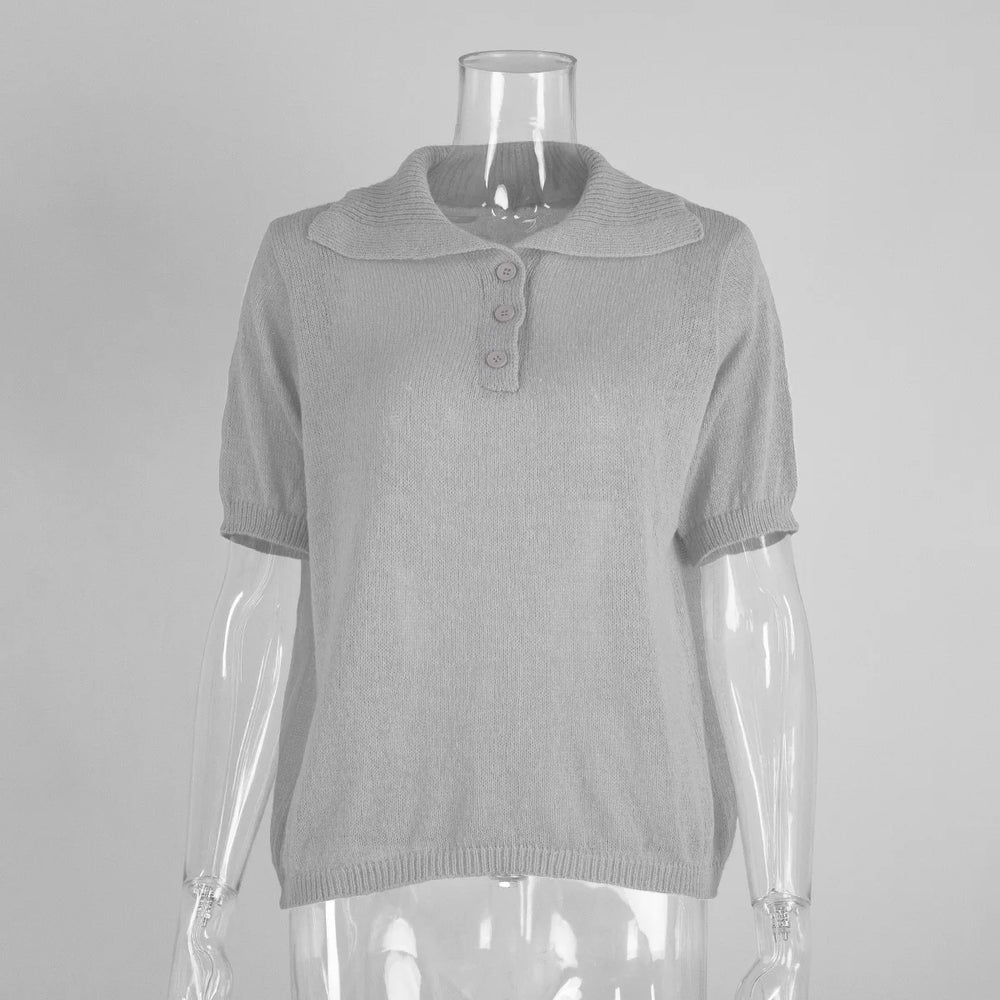 Gray short-sleeve top on a mannequin against a gray background