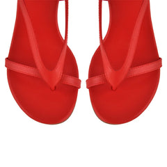 Close-up of red lace-up wedge sandals toe