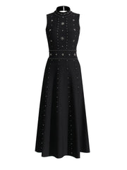 Black dress with silver embellishments on a white background