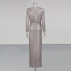 Silver sequin dress on a mannequin against a plain background