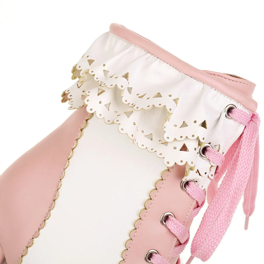 Pink and white lace-up shoe with decorative elements on a white background