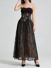 Black lace strapless gown on a white background