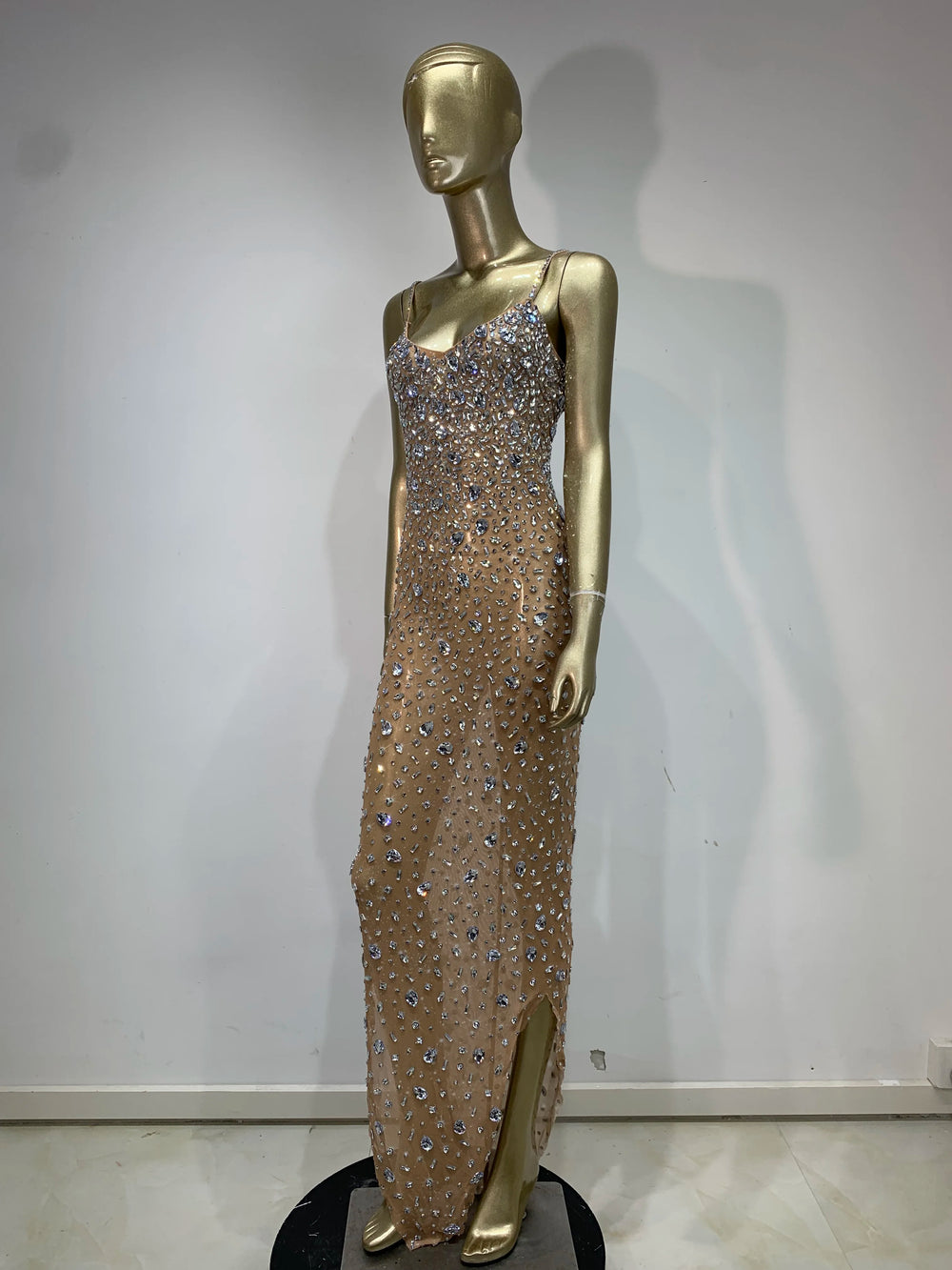 Nude embellished spaghetti strap floor-length dress