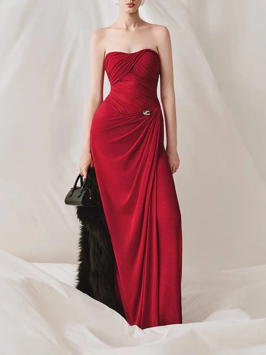 Red draped strapless maxi dress with faux fur wrap