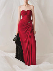 Red draped strapless maxi dress with faux fur wrap