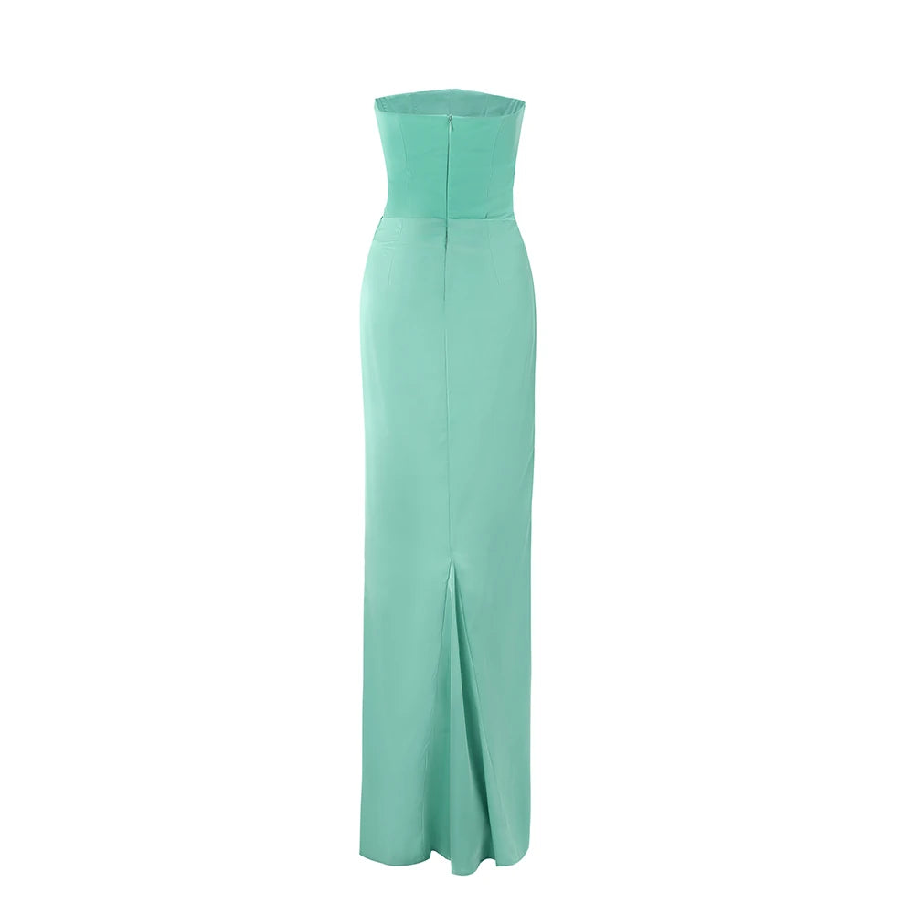 Mint green strapless gown on a white background