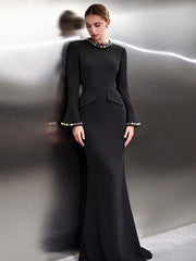 Black formal evening dress with crystal embellished neckline and flared sleeves