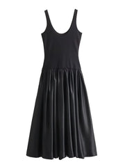 Black sleeveless dress on a white background