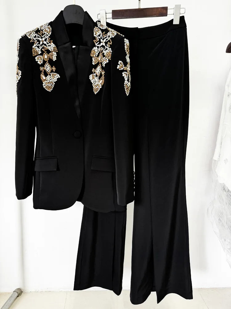 Embellished blazer and wide-leg pants suit displayed