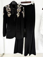Embellished blazer and wide-leg pants suit displayed