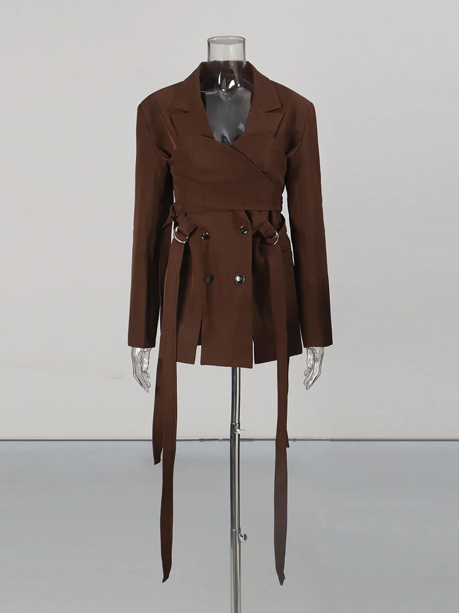 Brown coat on a mannequin against a white background