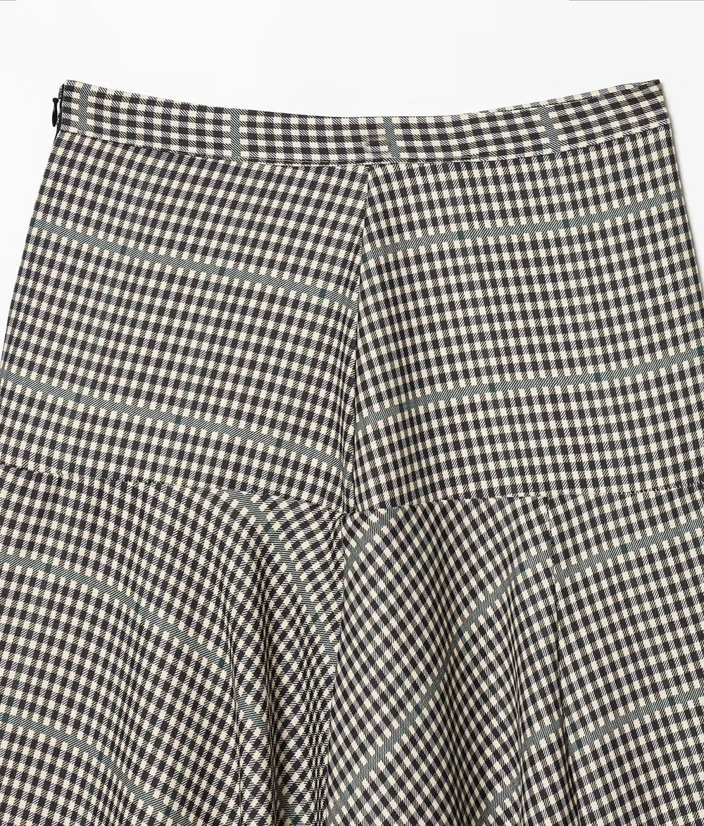 Black and white checkered pants on a light gray background