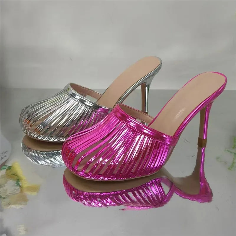 Pink and silver metallic stiletto mule heels side by side