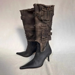 Pointed toe boots with chain detail