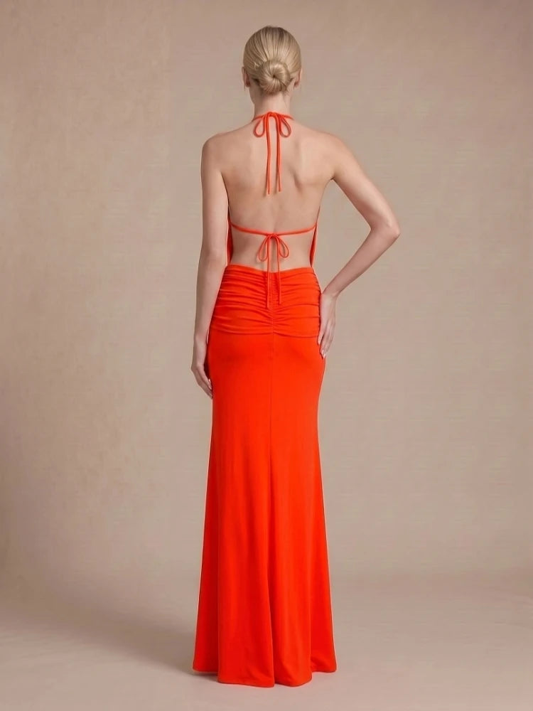 Back detail of halter neck twisted waist full length gown