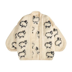 Knitted baby cardigan with sheep pattern on a white background