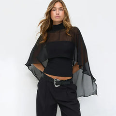 Back view of sheer cape overlay high neck top