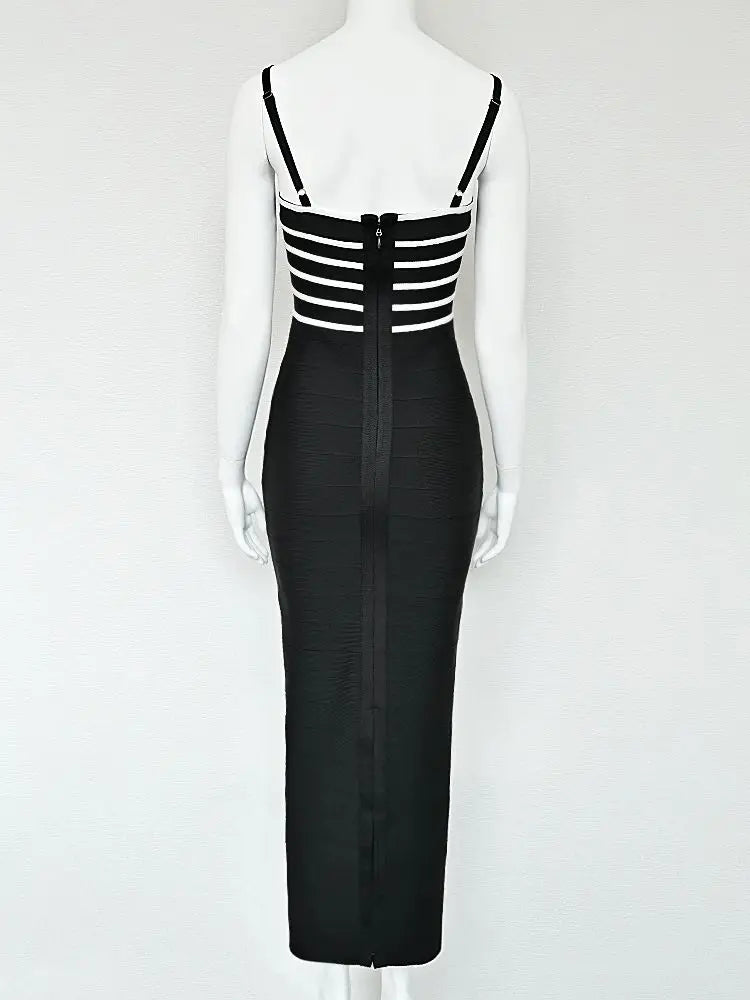 Black dress with white striped top on a mannequin against a white background