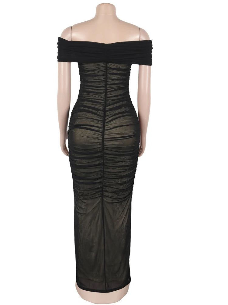 Black off-shoulder dress on a mannequin against a white background