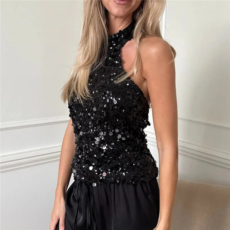 Black sequin halter neck crop top.