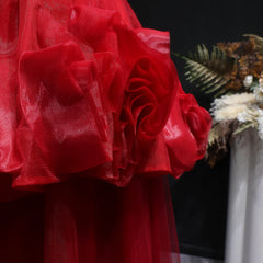 Close-up of a red floral arrangement with a blurred background
