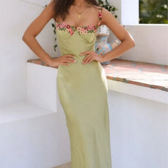 Satin slip dress with floral embroidered sweetheart neckline and spaghetti straps
