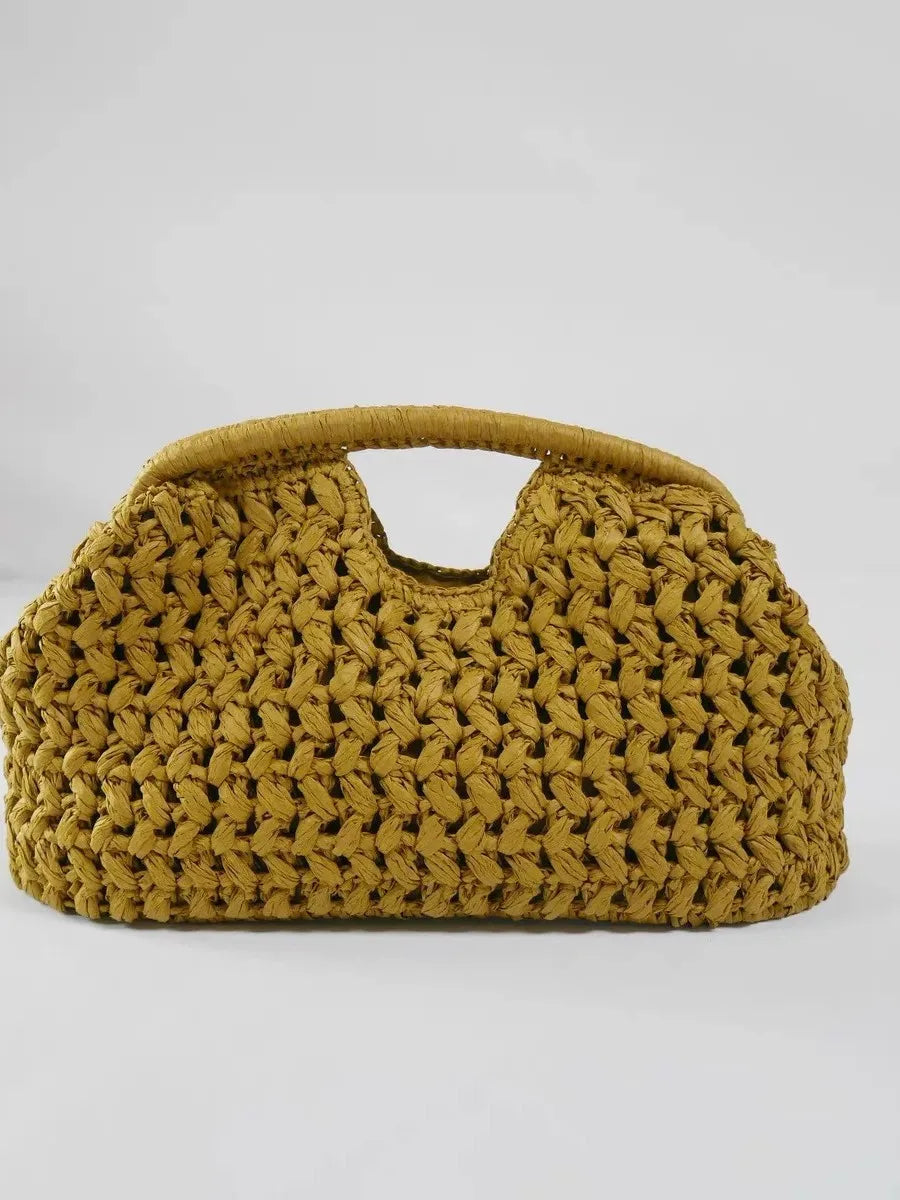 Yellow woven handbag on a light gray background