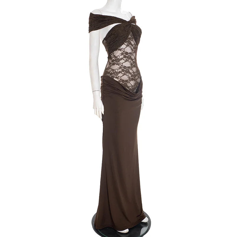 Brown evening gown with lace detailing on a mannequin against a white background
