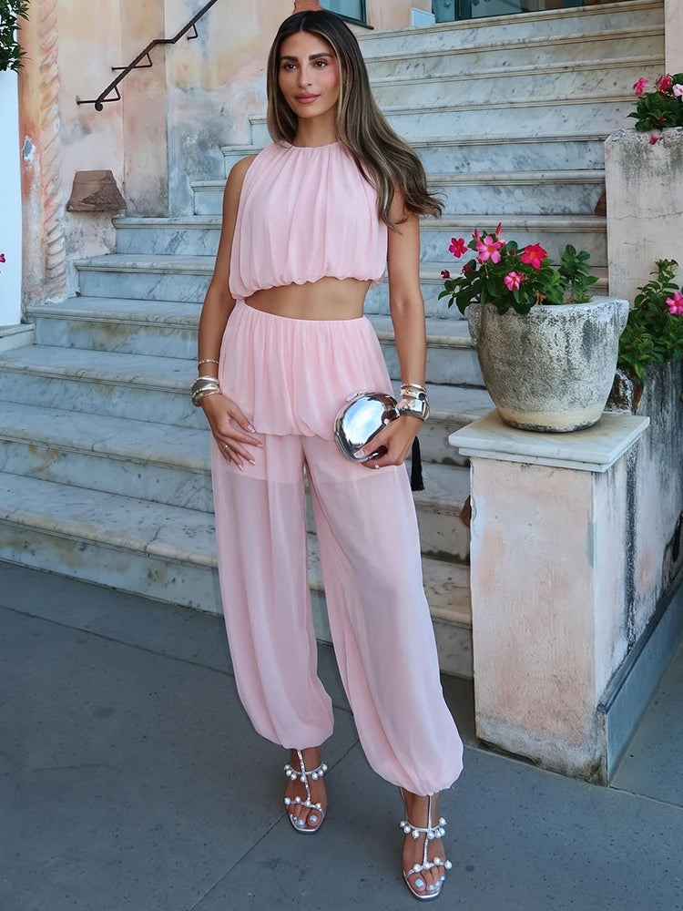 Sleeveless ruched crop top and flowing wide-leg pants set