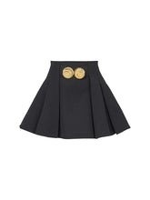 Black pleated mini skirt with gold metal buckles