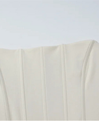 Close-up of a beige fabric texture on a white background